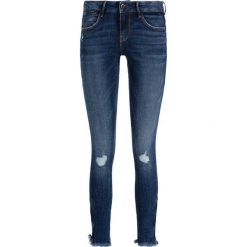 Jeansy Slim Fit Guess Jegging Zip W94A70 D3PY1. Niebieskie jeansy damskie Guess, z aplikacjami, z elastanu. W wyprzedaży za 289,00 zł.
