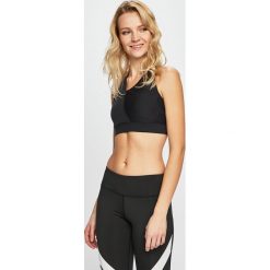 Under Armour - Biustonosz. Czarne biustonosze sportowe damskie Under Armour, xs, bez wzorów, z elastanu. W wyprzedaży za 99,90 zł.