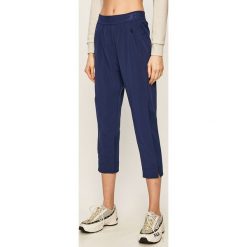 Tommy Sport - Spodnie. Niebieskie spodnie damskie Tommy Sport, s, bez wzorów, z elastanu, z podwyższonym stanem. Za 449,90 zł.