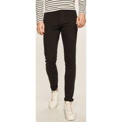 Tommy Hilfiger - Spodnie. Brązowe spodnie męskie TOMMY HILFIGER, bez wzorów, z elastanu. Za 499,90 zł.