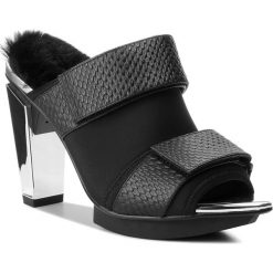Klapki UNITED NUDE - Lev Mule Hi 103550134130 Black. Czarne klapki damskie marki United Nude, ze skóry, na obcasie. W wyprzedaży za 629,00 zł.