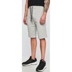 Guess Jeans - Szorty. Niebieskie spodenki i szorty męskie Guess Jeans, m, z aplikacjami, z bawełny, casualowe. W wyprzedaży za 179,90 zł.