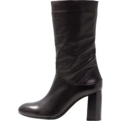Unisa OLIAS Kozaki black. Czarne buty zimowe damskie marki Unisa, z materiału. Za 669,00 zł.