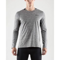 Bluza Craft Breakaway LS Tee M Szara. Szare bluzy męskie Craft, na lato, s, bez wzorów, z materiału, z dekoltem na plecach, bez rękawów, bez kaptura. Za 99,99 zł.