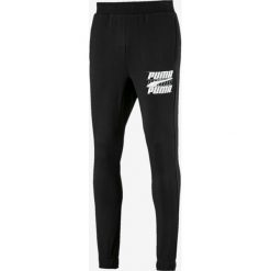 Puma Rebel Spodnie dresowe Czarny. Czarne spodnie męskie Puma, m, z nadrukiem, z bawełny. Za 223,95 zł.