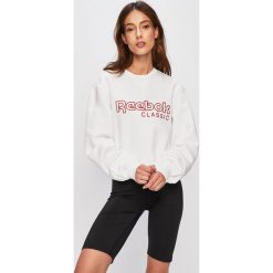Reebok Classic - Bluza. Białe bluzy damskie Reebok Classic, s, z aplikacjami, z elastanu, bez rękawów, bez kaptura. Za 229,90 zł.