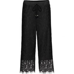 Spodnie culotte z koronką bonprix czarny. Czarne spodnie damskie bonprix, z koronki. Za 89,99 zł.