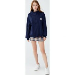 Bluza z suwakiem. Zielone bluzy damskie Pull&Bear, bez wzorów, bez rękawów, bez kaptura. Za 99,90 zł.