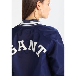 GANT THE VARSITY JACKET Kurtka Bomber persian blue. Niebieskie bomberki damskie marki GANT, xs, z materiału. Za 1049,00 zł.