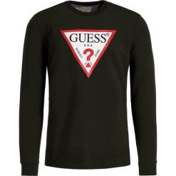 Bluza Guess M94Q24 K7ON0. Czerwone bluzy męskie Guess, xxl, z aplikacjami, z elastanu, bez kołnierzyka, bez rękawów, bez kaptura. W wyprzedaży za 239,00 zł.