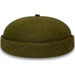 New Era - Czapka Cotton Skully. Żółte czapki damskie New Era, bez wzorów, z bawełny. W wyprzedaży za 119,90 zł.
