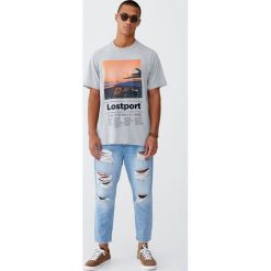 Jeansy loose fit z przetarciami. Szare jeansy męskie relaxed fit Pull&Bear. Za 159,00 zł.