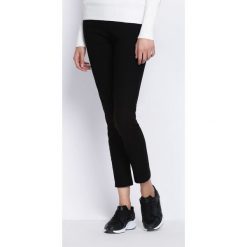 Czarne Jegginsy With Magic. Czarne jeansy damskie Born2be, xl, bez wzorów, z dzianiny. Za 79,99 zł.