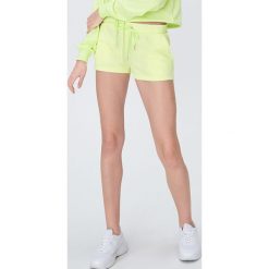 Dresowe szorty - Żółty. Żółte szorty damskie Sinsay, s, bez wzorów, z dresówki. Za 19,99 zł.