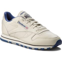 Buty Reebok - Cl Lthr 28413 Ecru/Navy. Brązowe buty sportowe damskie Reebok, bez wzorów, ze skóry, bez obcasa, na płaskiej podeszwie, bez zapięcia. W wyprzedaży za 259,00 zł.