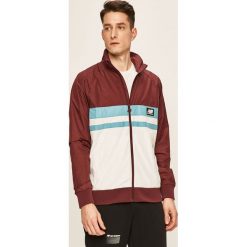 New Balance - Kurtka. Brązowe płaszcze męskie New Balance, s, bez wzorów, z poliesteru, krótkie, bez kaptura. W wyprzedaży za 269,90 zł.