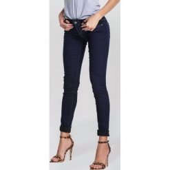 Granatowe Jeansy Sassy. Niebieskie jeansy damskie other, s, z jeansu. Za 49,99 zł.