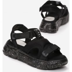 Czarne Sandały Fantasy Of Freedom. Czarne sandały damskie Born2be, bez wzorów, z softshellu, sportowe, bez obcasa, na płaskiej podeszwie, na rzepy. Za 109,99 zł.