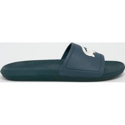 Lacoste - Klapki. Niebieskie kapcie męskie Lacoste, z materiału. W wyprzedaży za 149,90 zł.