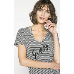 Guess Jeans - Top. Czarne topy damskie marki Guess Jeans, s, z aplikacjami, z elastanu. W wyprzedaży za 159,90 zł.