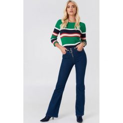Jeansy damskie: Trendyol Jeansy bootcut z suwakiem – Blue