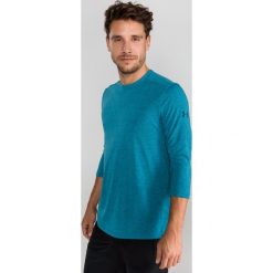 Under Armour Microthread™ Utility Koszulka Niebieski. Niebieskie podkoszulki męskie Under Armour, s, bez wzorów, z poliesteru, bez kołnierzyka, długie. Za 223,95 zł.