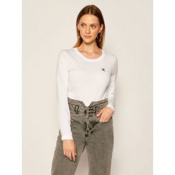 Bluzka Calvin Klein Jeans J20J214143. Białe bluzki damskie Calvin Klein Jeans, l, bez wzorów, z jeansu, bez kołnierzyka, bez rękawów. Za 179,00 zł.