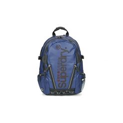 Plecaki Superdry SILVER TARP BACKPACK. Szare plecaki damskie marki Superdry, l, z tkaniny, z okrągłym kołnierzem, na ramiączkach. Za 349,00 zł.