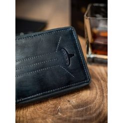 Portfel męski skórzany RFID Buffalo Wild granatowy - Niebieski. Niebieskie portfele męskie BUFFALO WILD, bez wzorów, ze skóry. Za 69,99 zł.