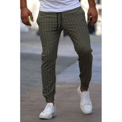 Spodnie męskie VION KHAKI. Brązowe jeansy męskie Spodnie męskie VION KHAKI, s, bez wzorów, z jeansu, sportowe. W wyprzedaży za 99,00 zł.