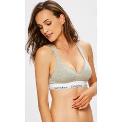 Calvin Klein Underwear - Biustonosz sportowy. Czarne biustonosze sportowe damskie Calvin Klein Underwear, s, bez wzorów, z elastanu. W wyprzedaży za 149,90 zł.