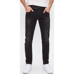 Jeansy slim fit - Czarny. Czarne jeansy męskie House, m, bez wzorów. Za 99,99 zł.