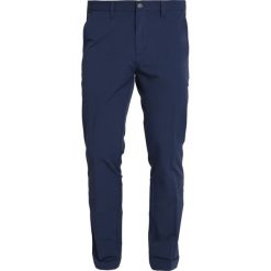 Adidas Golf ULTIMATE FALL Spodnie materiałowe collegiate navy. Niebieskie spodnie męskie marki adidas Golf, m, bez wzorów, z elastanu, sportowe, długie. Za 419,00 zł.