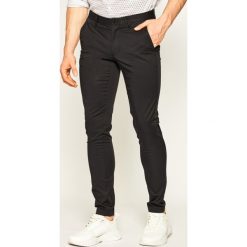 Spodnie materiałowe MICHAEL Michael Kors CS93CTJ4JJ. Czerwone jeansy męskie MICHAEL Michael Kors, m, bez wzorów, z elastanu. Za 429,00 zł.