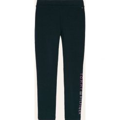 Tommy Hilfiger - Legginsy dziecięce 128-176 CM. Niebieskie spodnie dziewczęce TOMMY HILFIGER, z nadrukiem, z elastanu. Za 199,90 zł.