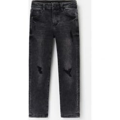 Jeansy slim fit - Czarny. Czarne jeansy damskie Reserved, bez wzorów, z jeansu. Za 59,99 zł.