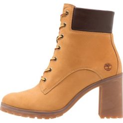 Timberland ALLINGTON 6IN LACE UP Botki sznurowane wheat. Żółte botki damskie skórzane marki Timberland, na sznurówki. Za 589,00 zł.
