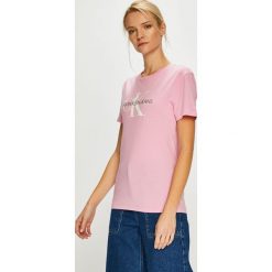 Calvin Klein Jeans - Top. Pomarańczowe bluzki damskie Calvin Klein Jeans, s, z nadrukiem, z bawełny, z okrągłym kołnierzem. W wyprzedaży za 129,90 zł.