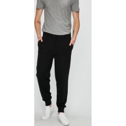 Calvin Klein Jeans - Spodnie. Czarne spodnie męskie Calvin Klein Jeans, na co dzień, xl, bez wzorów, z elastanu, casualowe. W wyprzedaży za 219,90 zł.