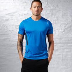 Reebok Koszulka męska Work Out Ready Tech Top niebieska r. XL (AJ2891). Niebieskie topy damskie Reebok, xl. Za 79,00 zł.