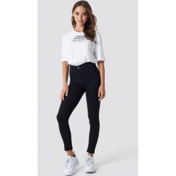 Cheap Monday Jeansy z wysokim stanem Spray - Black. Czarne jeansy damskie z wysokim stanem marki Cheap Monday, z jeansu. Za 161,95 zł.