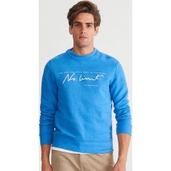 Bluza ze strukturalnej dzianiny - Niebieski. Czerwone bluzy męskie marki KALENJI, m, z elastanu, z długim rękawem, długie. Za 99,99 zł.