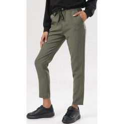 Khaki Spodnie Mhyrera. Brązowe spodnie damskie Born2be, s. Za 129,99 zł.