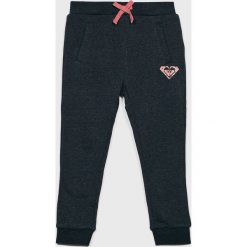 Roxy - Spodnie dziecięce 91-122 cm. Niebieskie spodnie dziewczęce Roxy, bez wzorów, z bawełny, sportowe. W wyprzedaży za 69,90 zł.