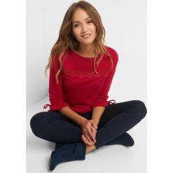 Koszulka z koronkową wstawką. Różowe t-shirty damskie Orsay, xs, w jednolite wzory, z elastanu, z falbankami, z długim rękawem. Za 69,99 zł.