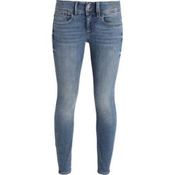 GStar LYNN MID SKINNY ANKLE Jeans Skinny Fit medium indigo aged. Niebieskie jeansy damskie G-Star, z bawełny. Za 559,00 zł.