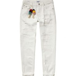 Dżinsy "Heidi" - Slim fit - w kolorze białym. Białe jeansy damskie Denim Special, l, w paski. W wyprzedaży za 193,95 zł.