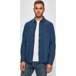Calvin Klein Jeans - Koszula jeansowa. Niebieskie koszule męskie Calvin Klein Jeans, s, bez wzorów, z bawełny, klasyczne, z klasycznym kołnierzykiem, z długim rękawem. Za 379,90 zł.