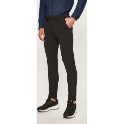 Jack & Jones - Spodnie Marco. Szare spodnie męskie Jack & Jones, na co dzień, bez wzorów, z elastanu, casualowe. W wyprzedaży za 179,90 zł.