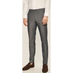 Tommy Hilfiger Tailored - Spodnie. Szare spodnie męskie Tommy Hilfiger Tailored, na co dzień, bez wzorów, z elastanu. Za 539,90 zł.